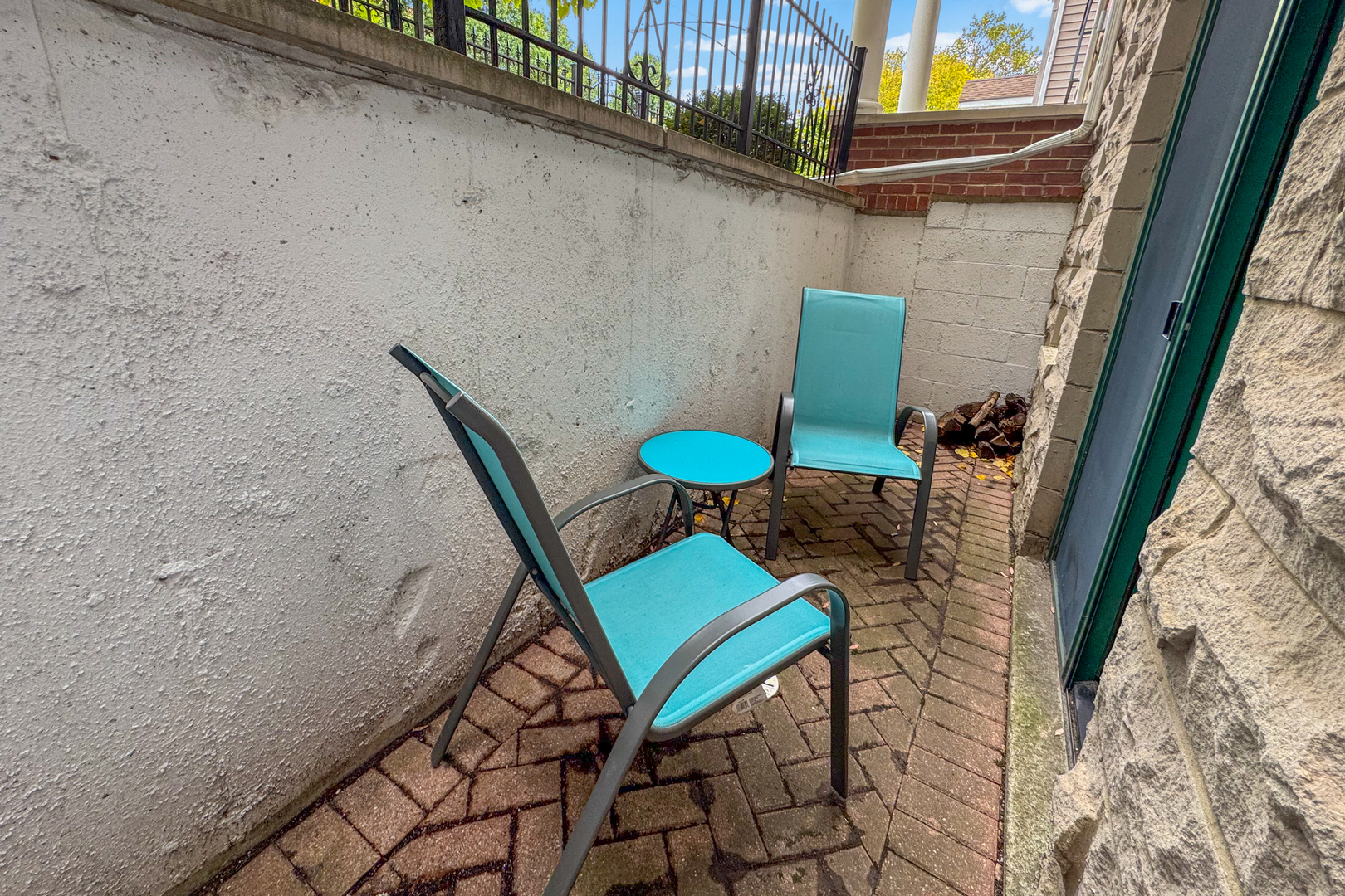 2106 West Erie Street, Unit 1E Chicago, IL 60612 - Photo 25 of 41 a view of a chairs in a balcony