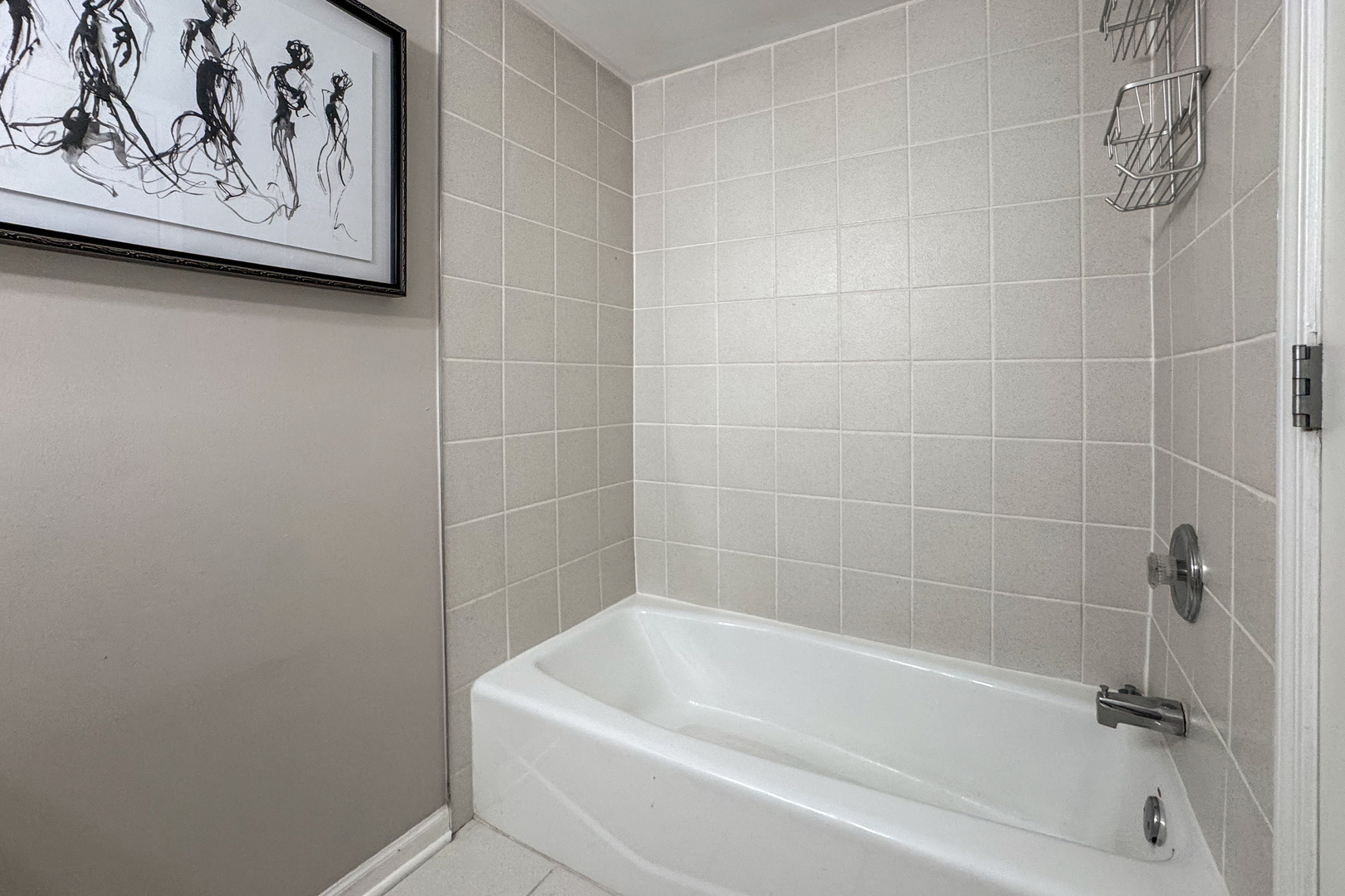 2106 West Erie Street, Unit 1E Chicago, IL 60612 - Photo 34 of 41 a white bath tub sitting next to a white wall