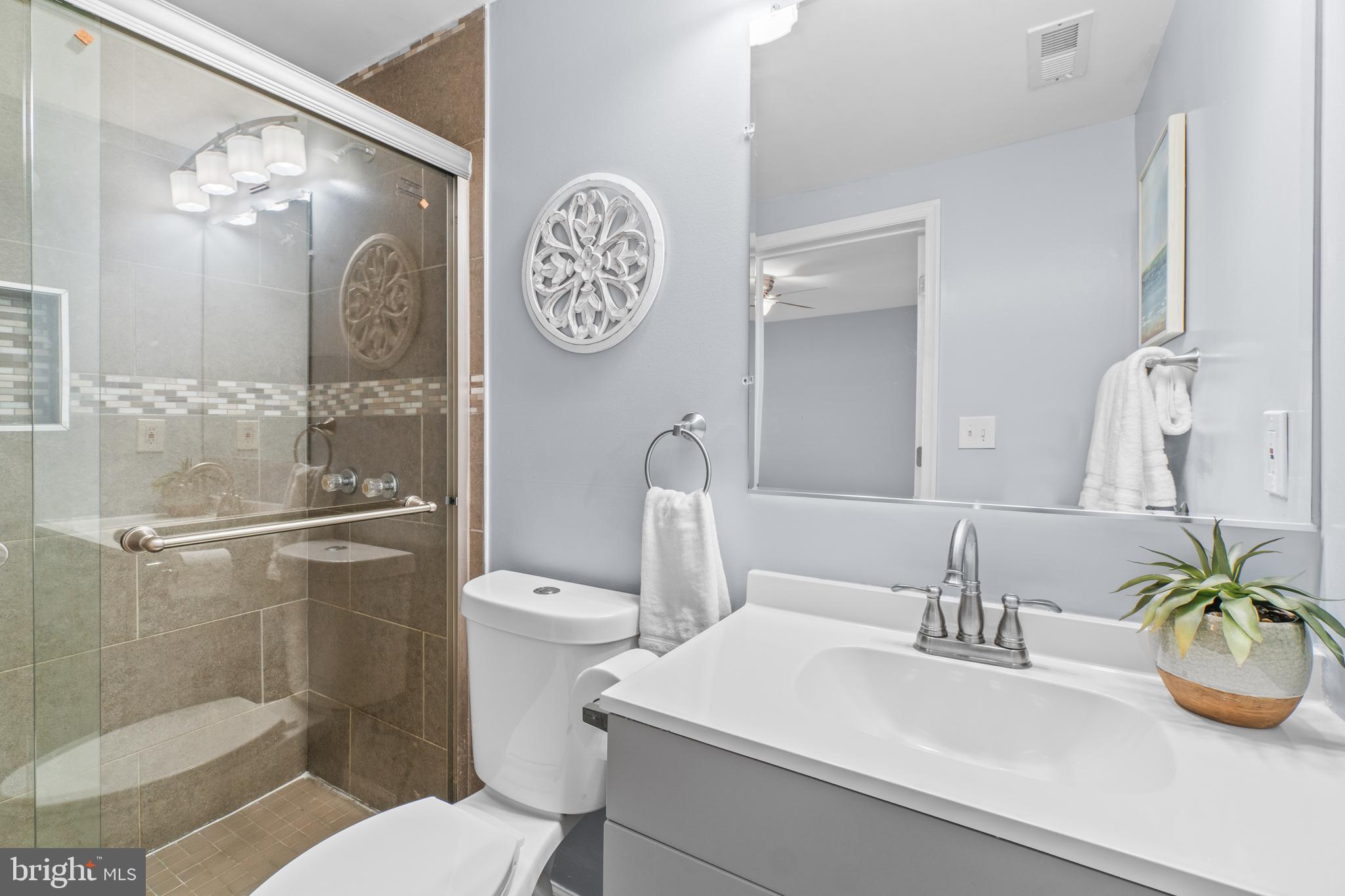 1009 Upton Road Glen Burnie, MD 21060 - Photo 16 of 31 Primary ensuite bath with glass-enclosed shower