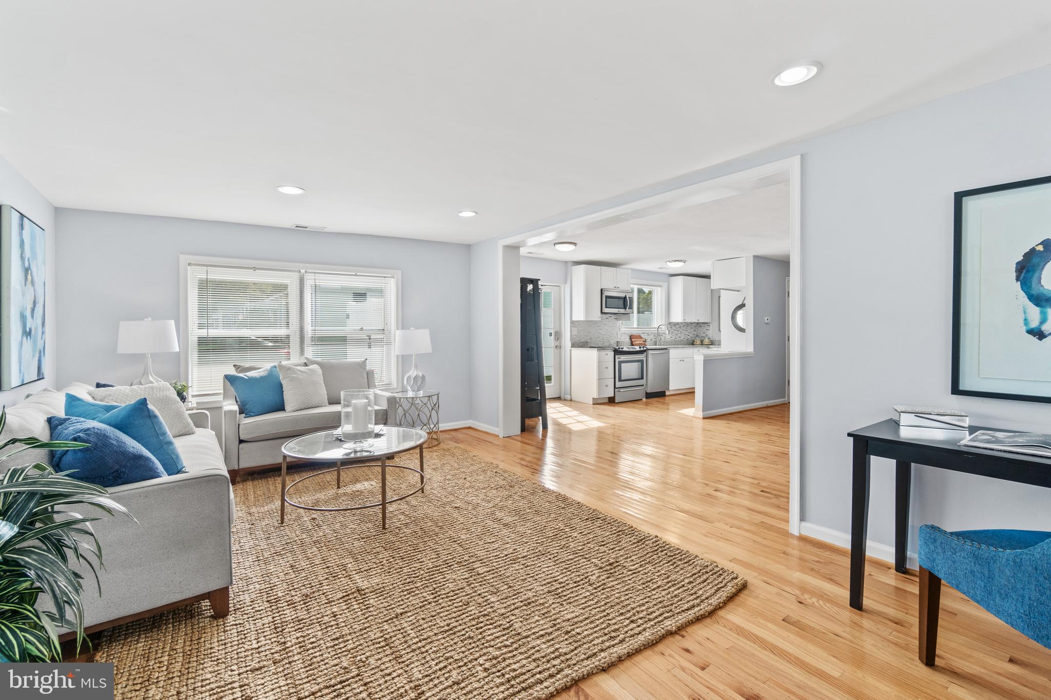 1009 Upton Road Glen Burnie, MD 21060 - Photo 8 of 31 Living room opens to dining area and kitchen
