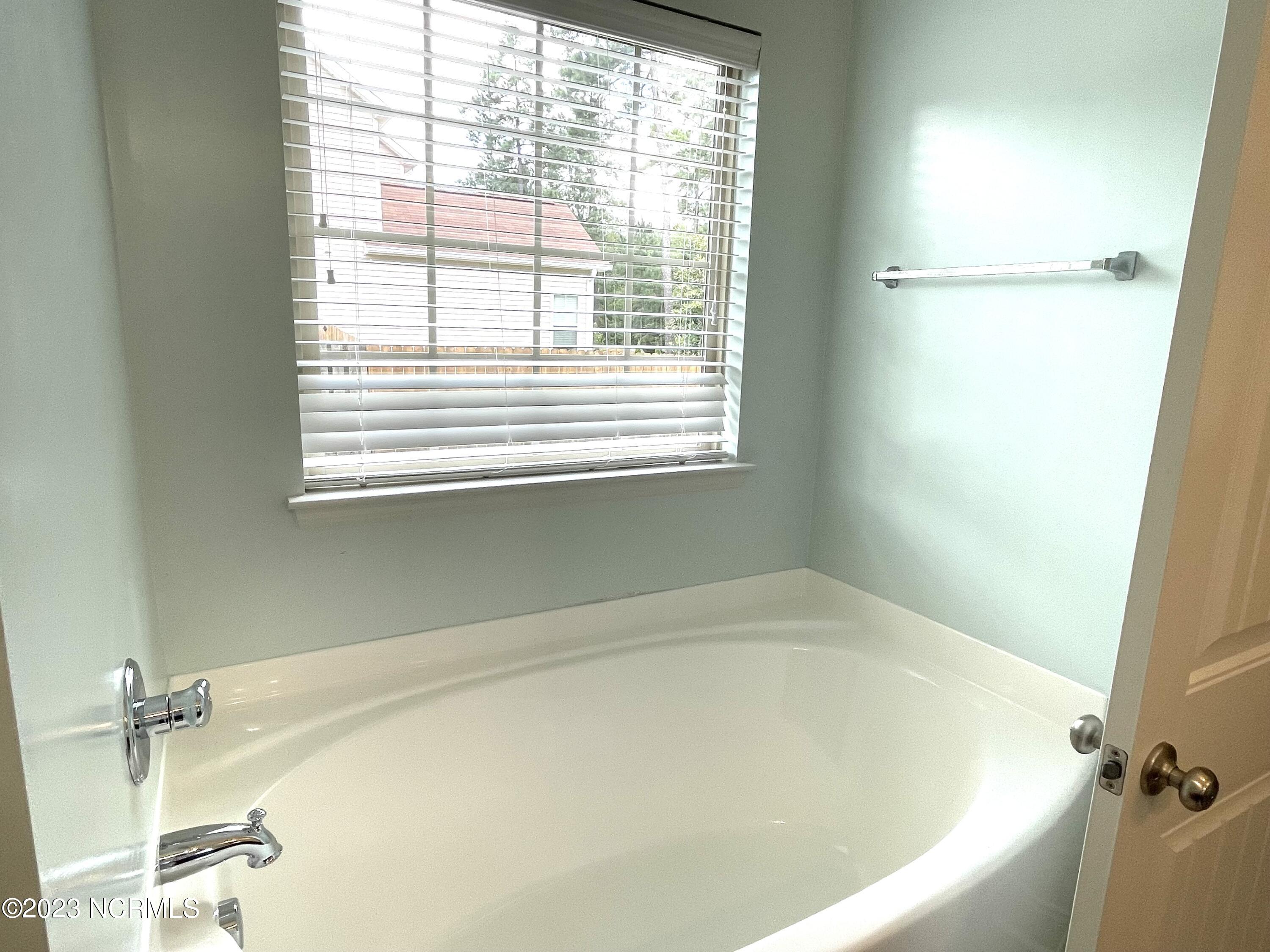 764 Sun Road Aberdeen, NC 28315 - Photo 13 of 34 Master bath garden tub