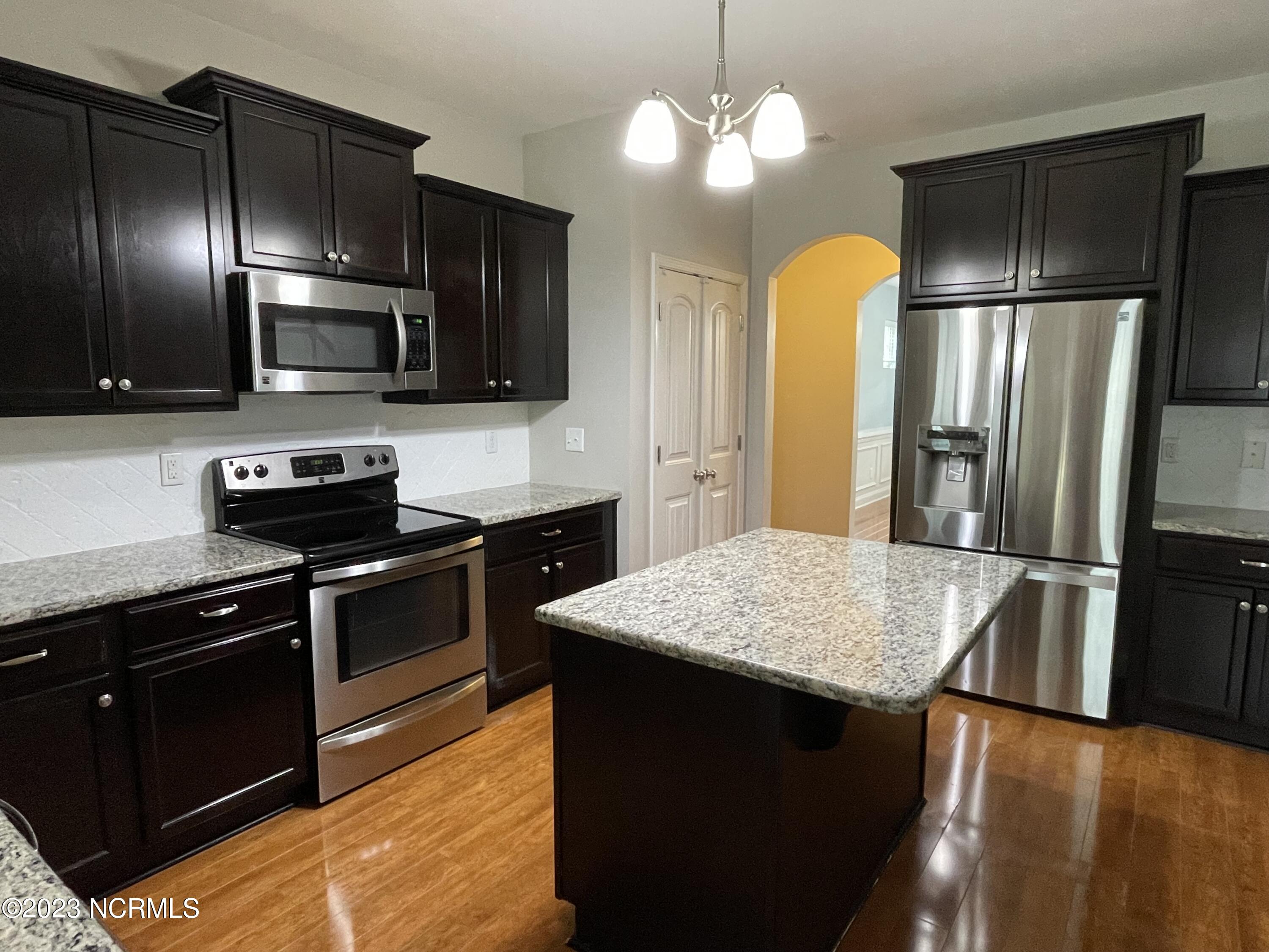 764 Sun Road Aberdeen, NC 28315 - Photo 7 of 34 Kitchen with Island
