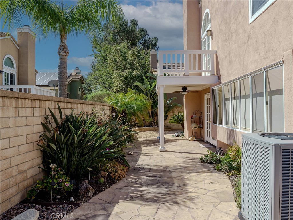 6853 Pandino Court Rancho Cucamonga, CA 91701 - Photo 24 of 44 a front view of a house with garden