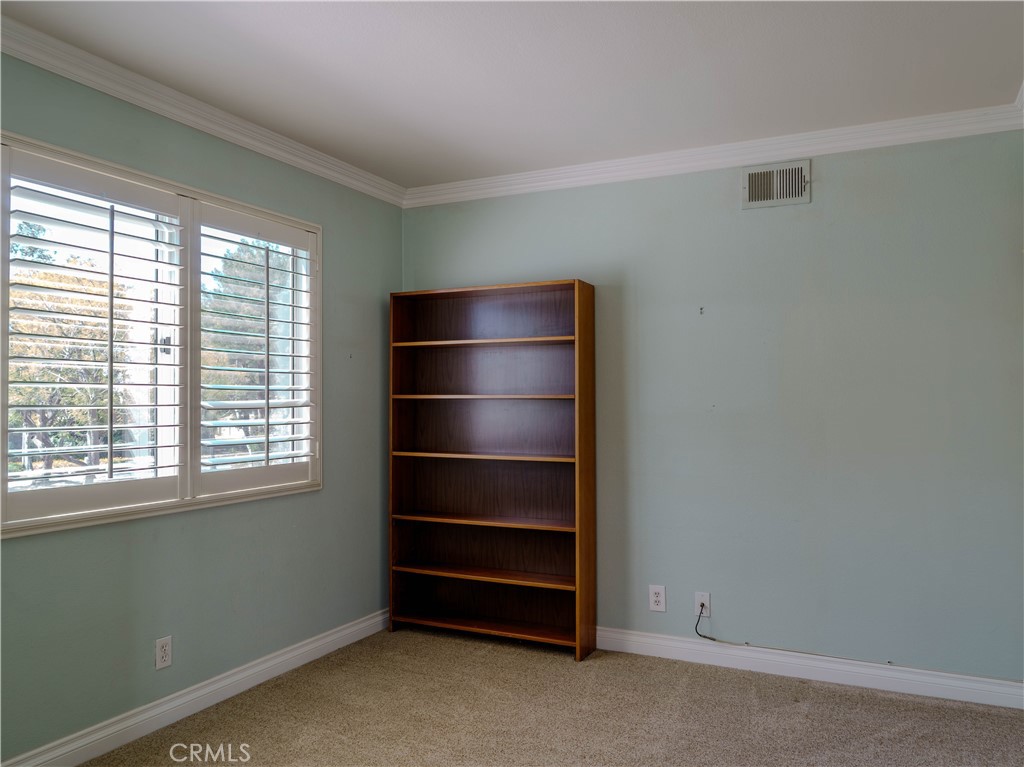 6853 Pandino Court Rancho Cucamonga, CA 91701 - Photo 28 of 44 a room with a furniture and a window