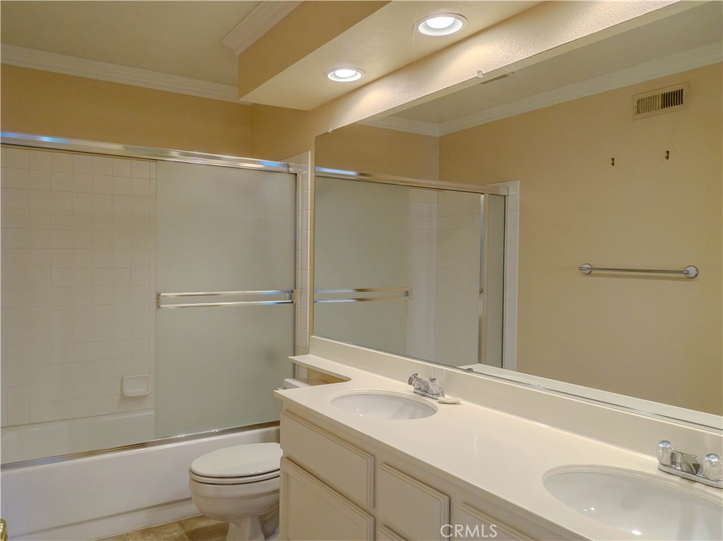 6853 Pandino Court Rancho Cucamonga, CA 91701 - Photo 31 of 44 a bathroom with a sink toilet and shower