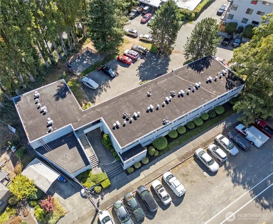 an aerial view of a house pool patio and outdoor seating