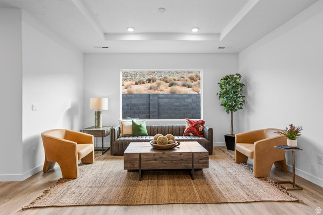 1624 South Staircase Way, Unit 4183 Washington, UT 84780 - Photo 15 of 47 Living area featuring wood-finish flooring and a central area rug