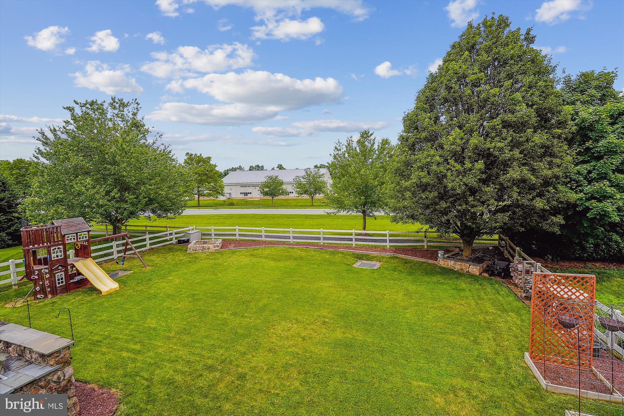 17128 Magic Mountain Drive Round Hill, VA 20141 - Photo 49 of 53 Large fenced yard with beautiful landscaping