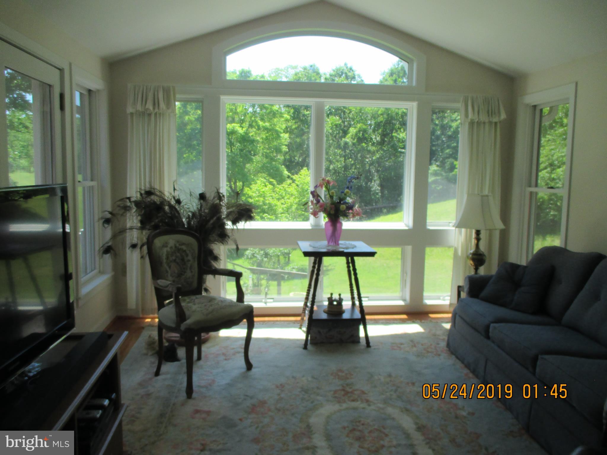 14642 Orchard Ridge Road Hancock, MD 21750 - Photo 27 of 43 Sun room has a view that's fantastic