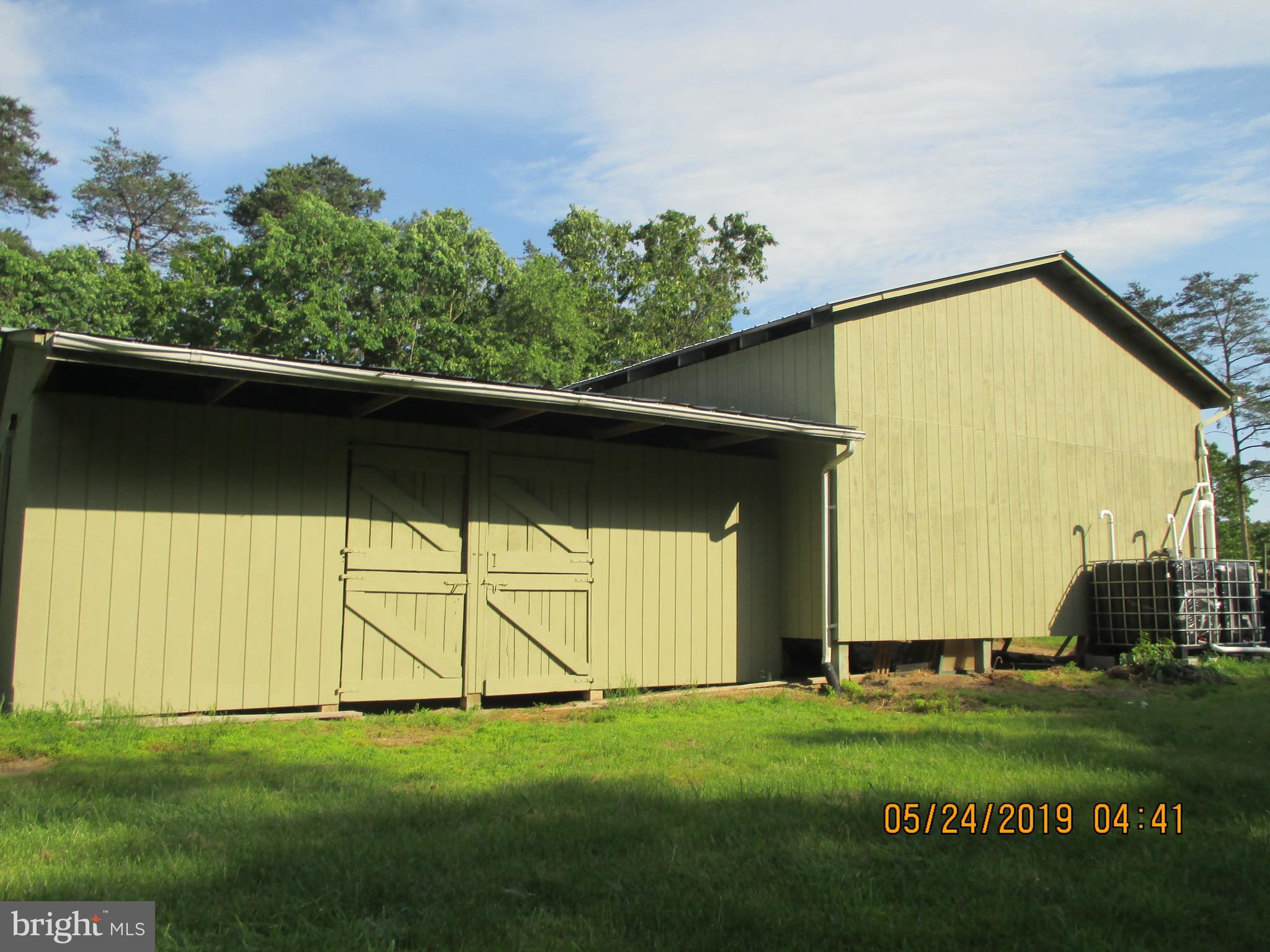 14642 Orchard Ridge Road Hancock, MD 21750 - Photo 5 of 43 Barn L has 4 box stalls & center aisle
