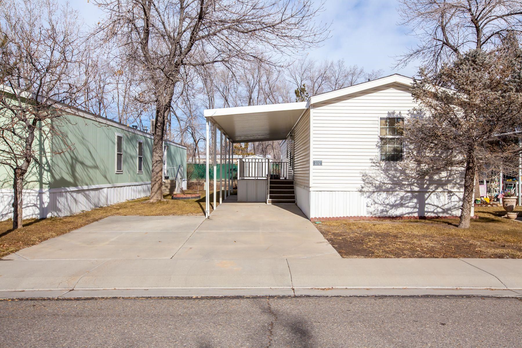 a view of a house with snow on the road