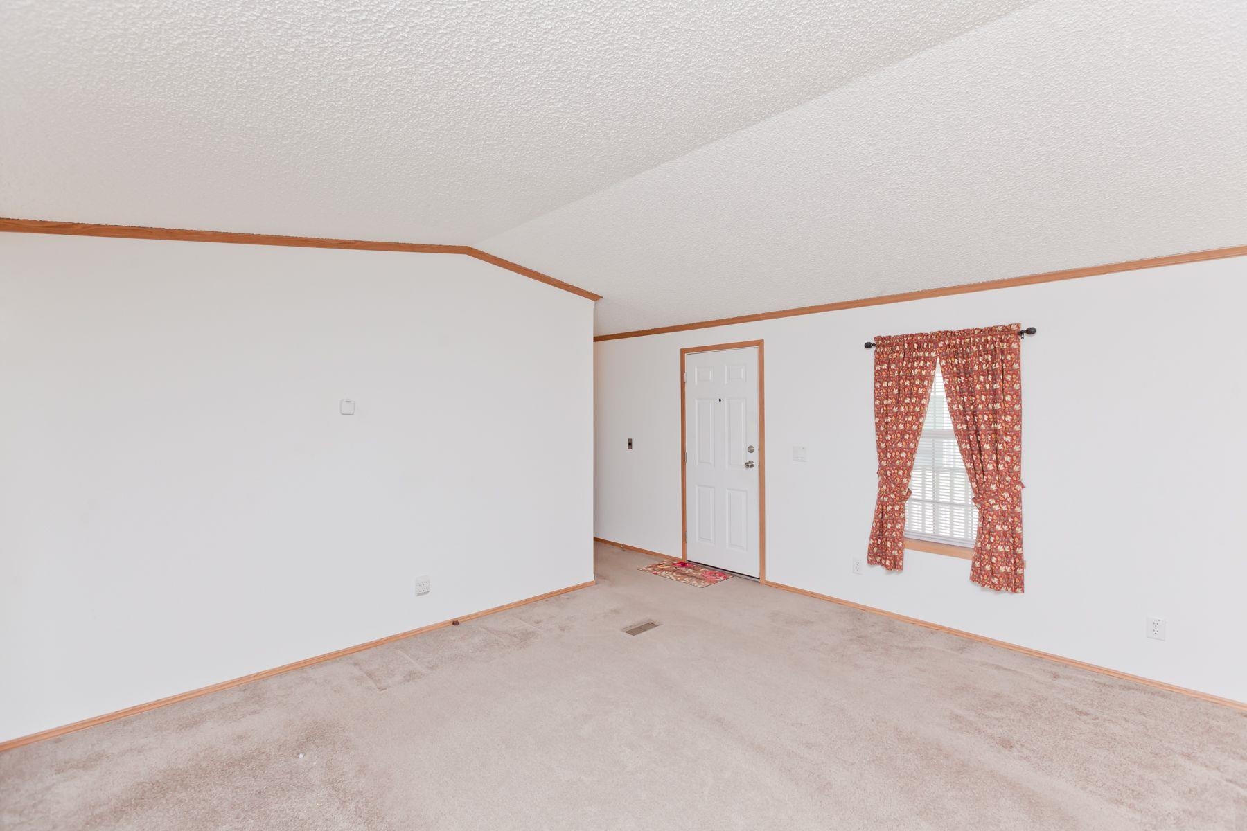 435 32 Road, Unit 232 Clifton, CO 81520 - Photo 13 of 37 an empty room with windows