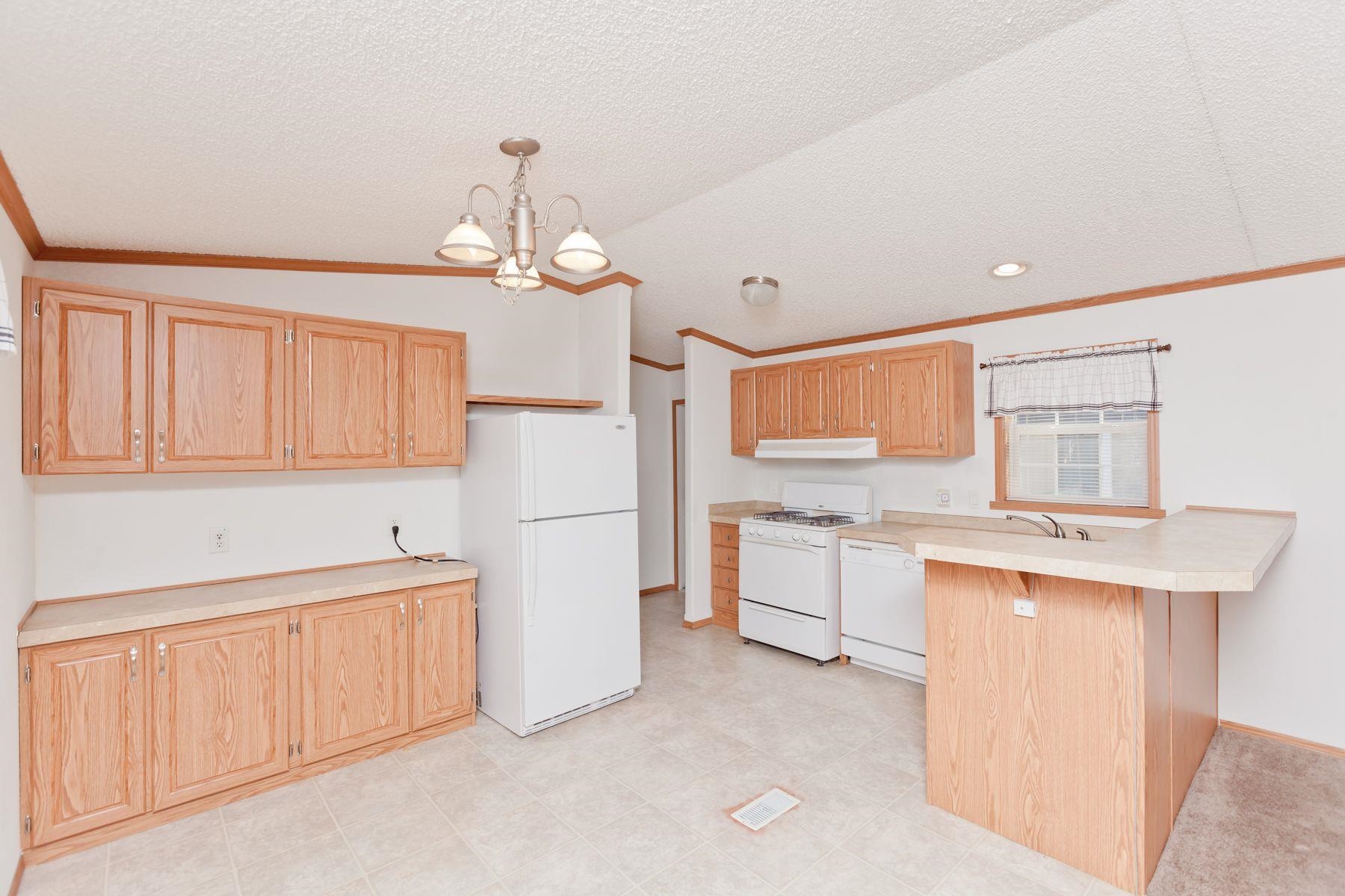435 32 Road, Unit 232 Clifton, CO 81520 - Photo 16 of 37 a kitchen that has a lot of cabinets in it