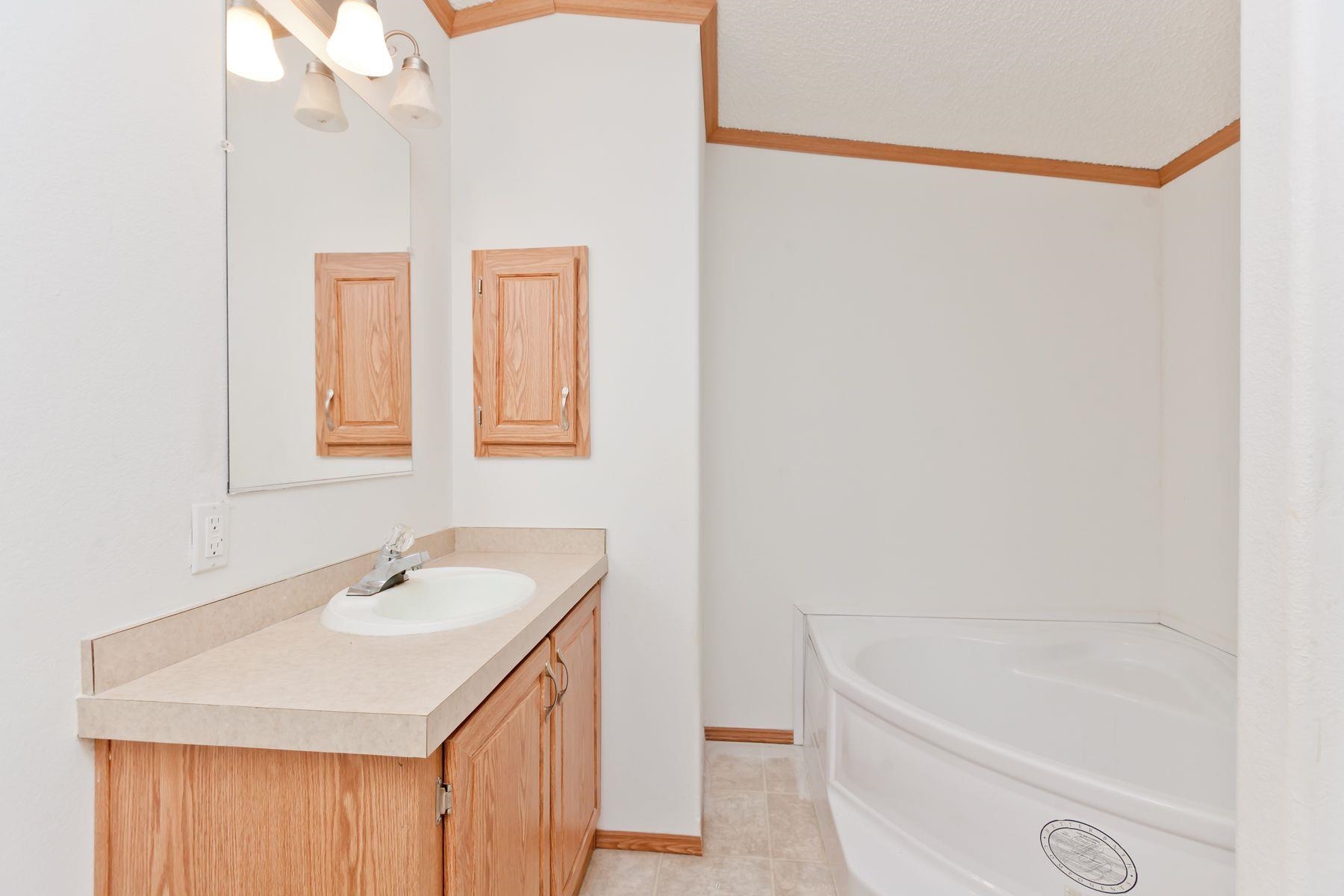 435 32 Road, Unit 232 Clifton, CO 81520 - Photo 22 of 37 a bathroom with a sink and a bathtub