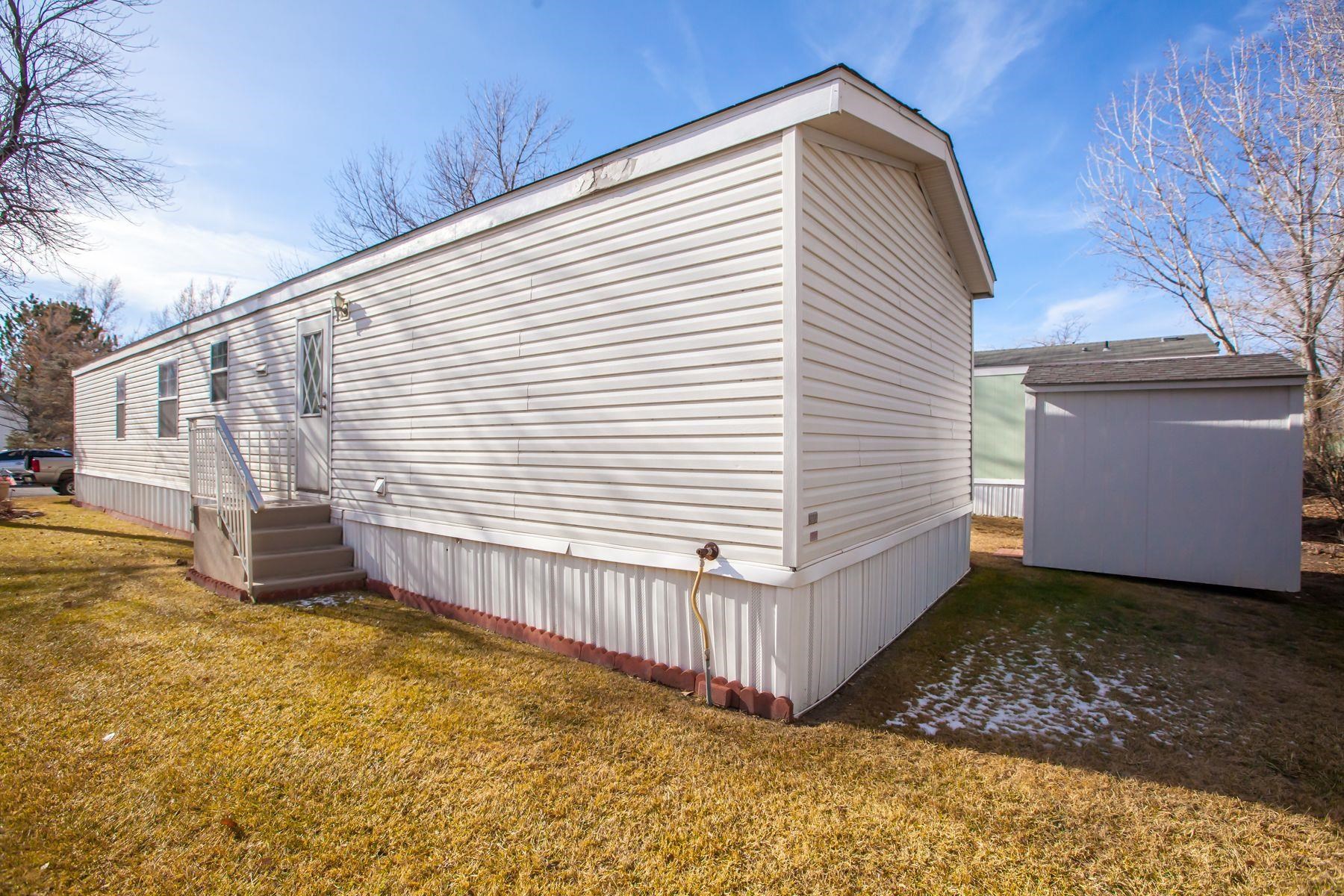 435 32 Road, Unit 232 Clifton, CO 81520 - Photo 8 of 37 a view of a house with a yard