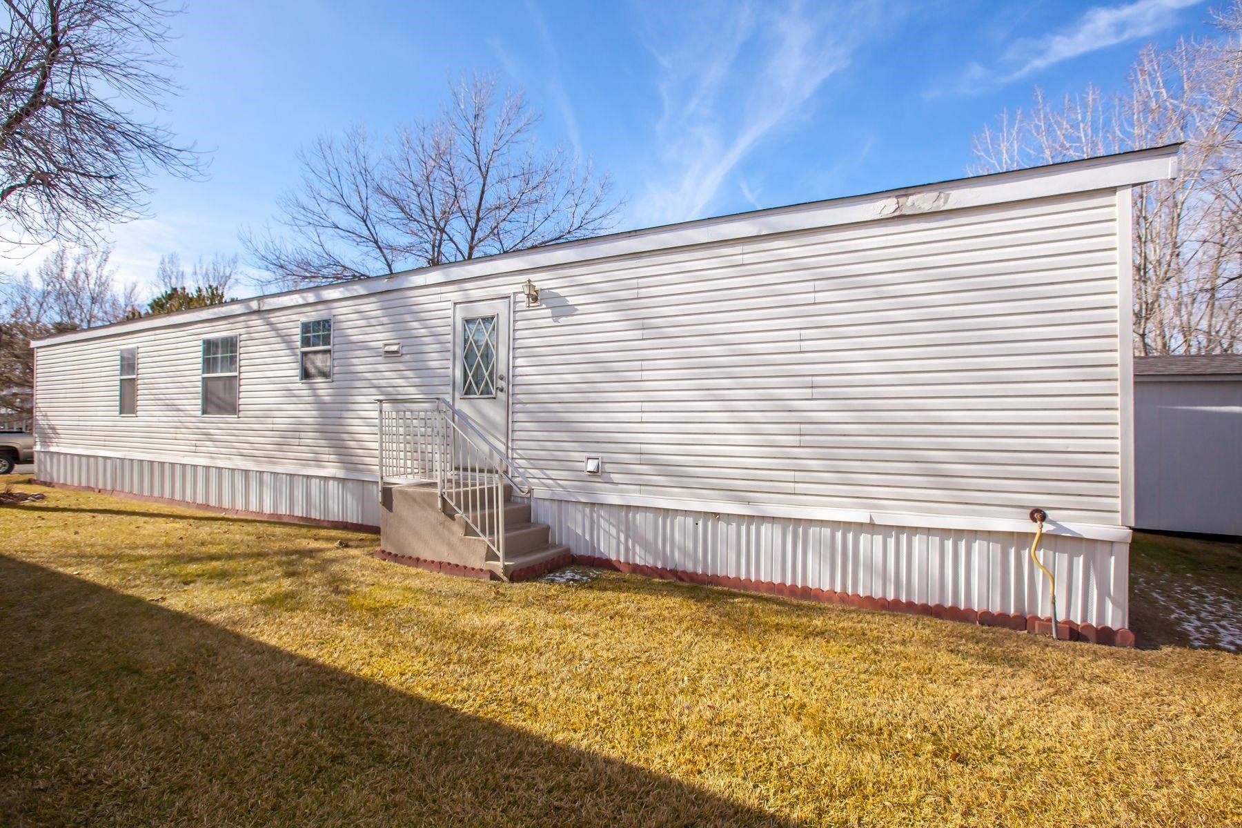 435 32 Road, Unit 232 Clifton, CO 81520 - Photo 9 of 37 a view of a backyard with a large tree