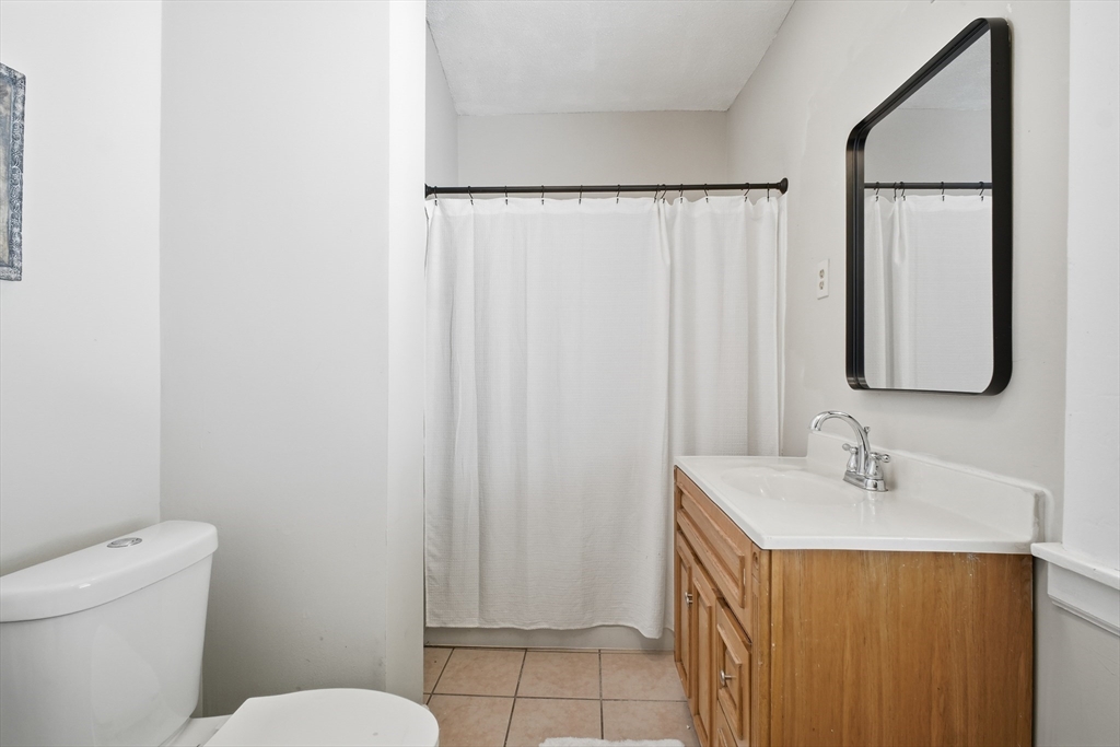 51-53 Abbe Avenue Springfield, MA 01107 - Photo 36 of 42 a bathroom with a sink a toilet and shower