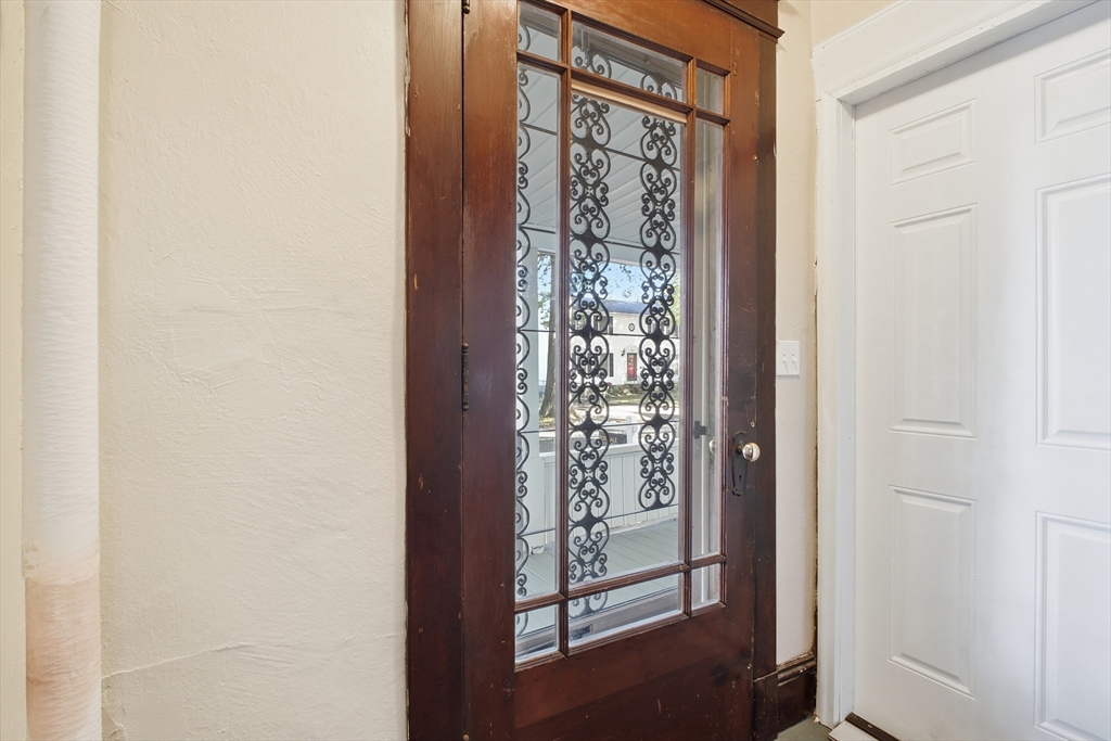 51-53 Abbe Avenue Springfield, MA 01107 - Photo 5 of 42 a view of front door with a mirror