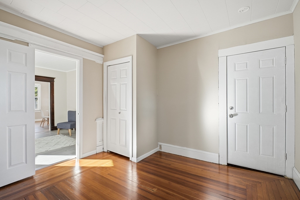 51-53 Abbe Avenue Springfield, MA 01107 - Photo 7 of 42 an empty room with wooden floor & closet area