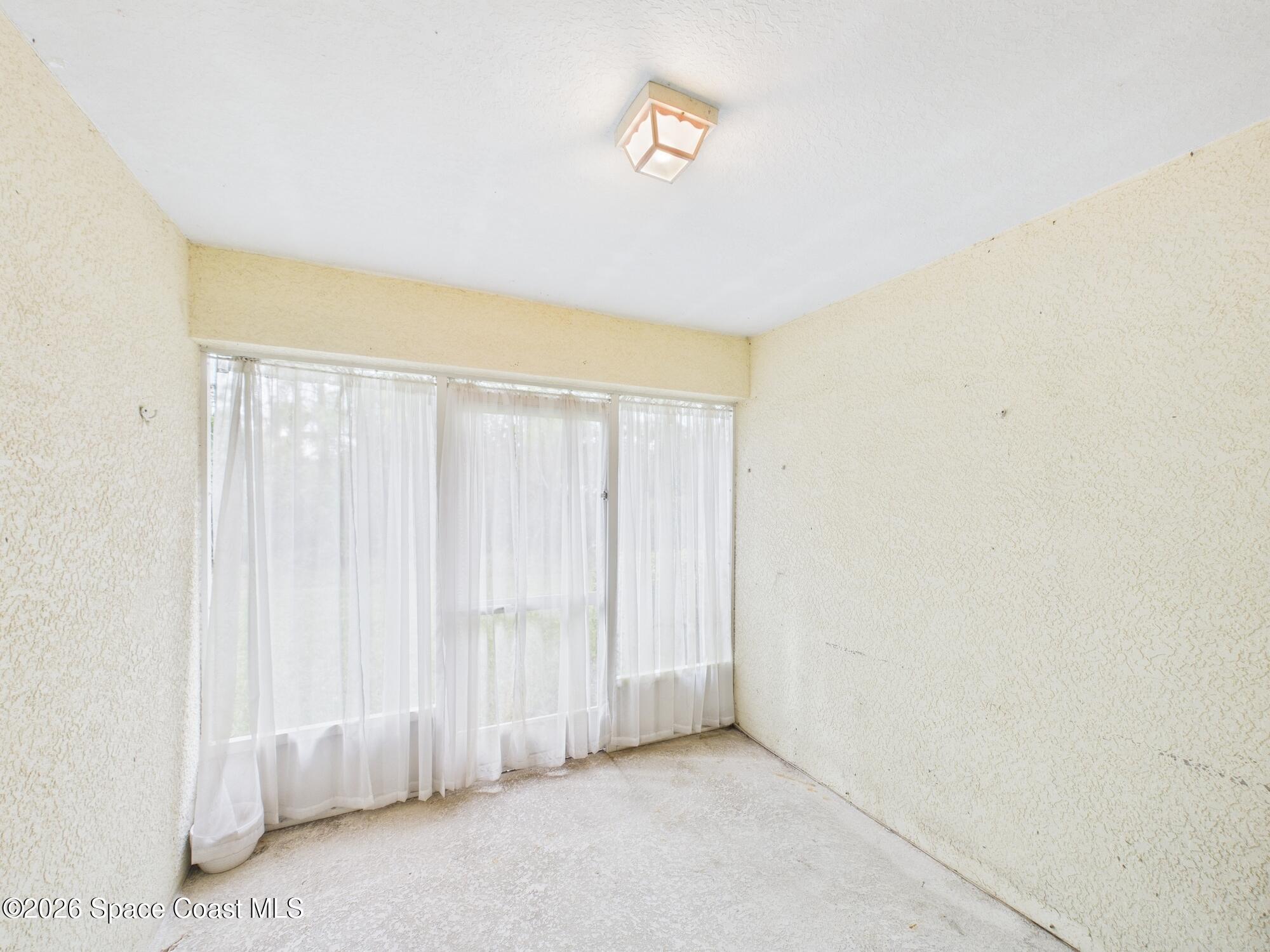 131 Maggie Way Sebastian, FL 32958 - Photo 18 of 19 a view of a room with a window