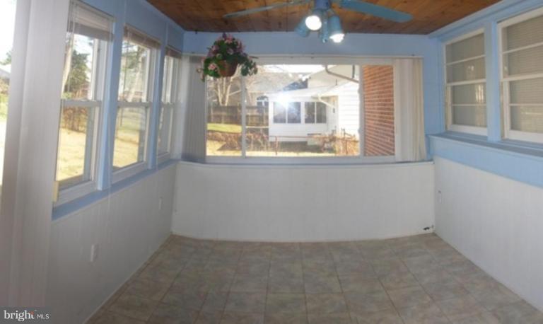 6716 Edsall Road Springfield, VA 22151 - Photo 14 of 17 a view of empty room with windows