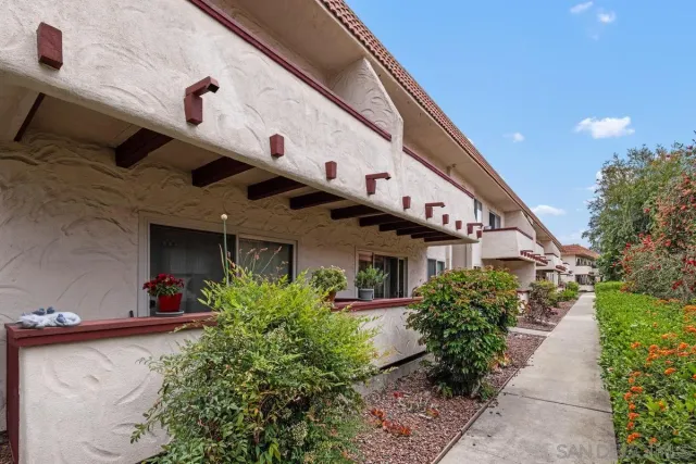 a front view of a building with an outdoor space