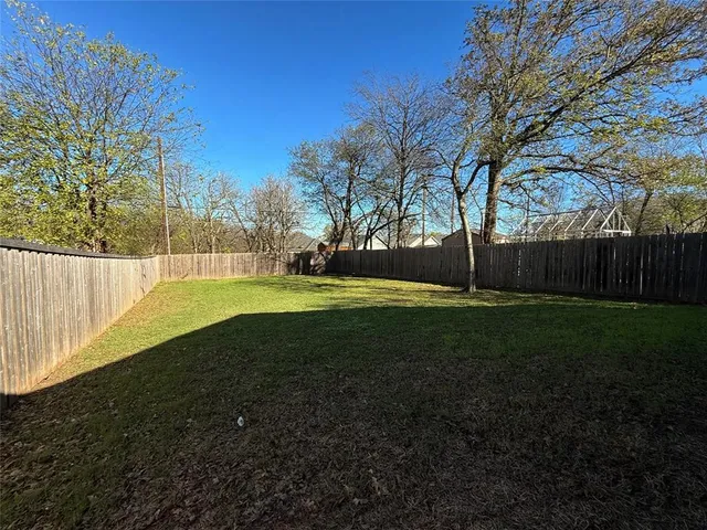 a view of garden with trees