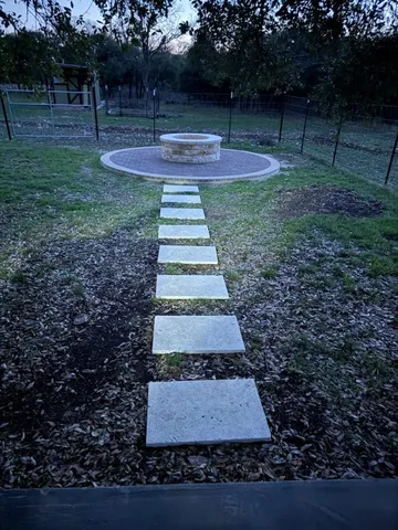 a big yard with lots of green space and fog