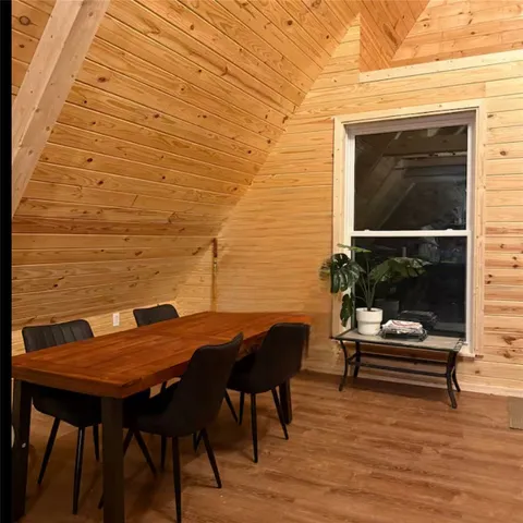 a bedroom with furniture and a chandelier