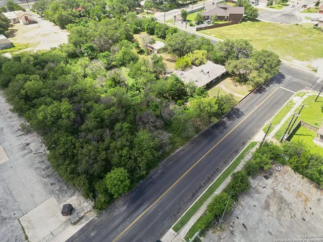 view of a lake with a floor to ceiling window