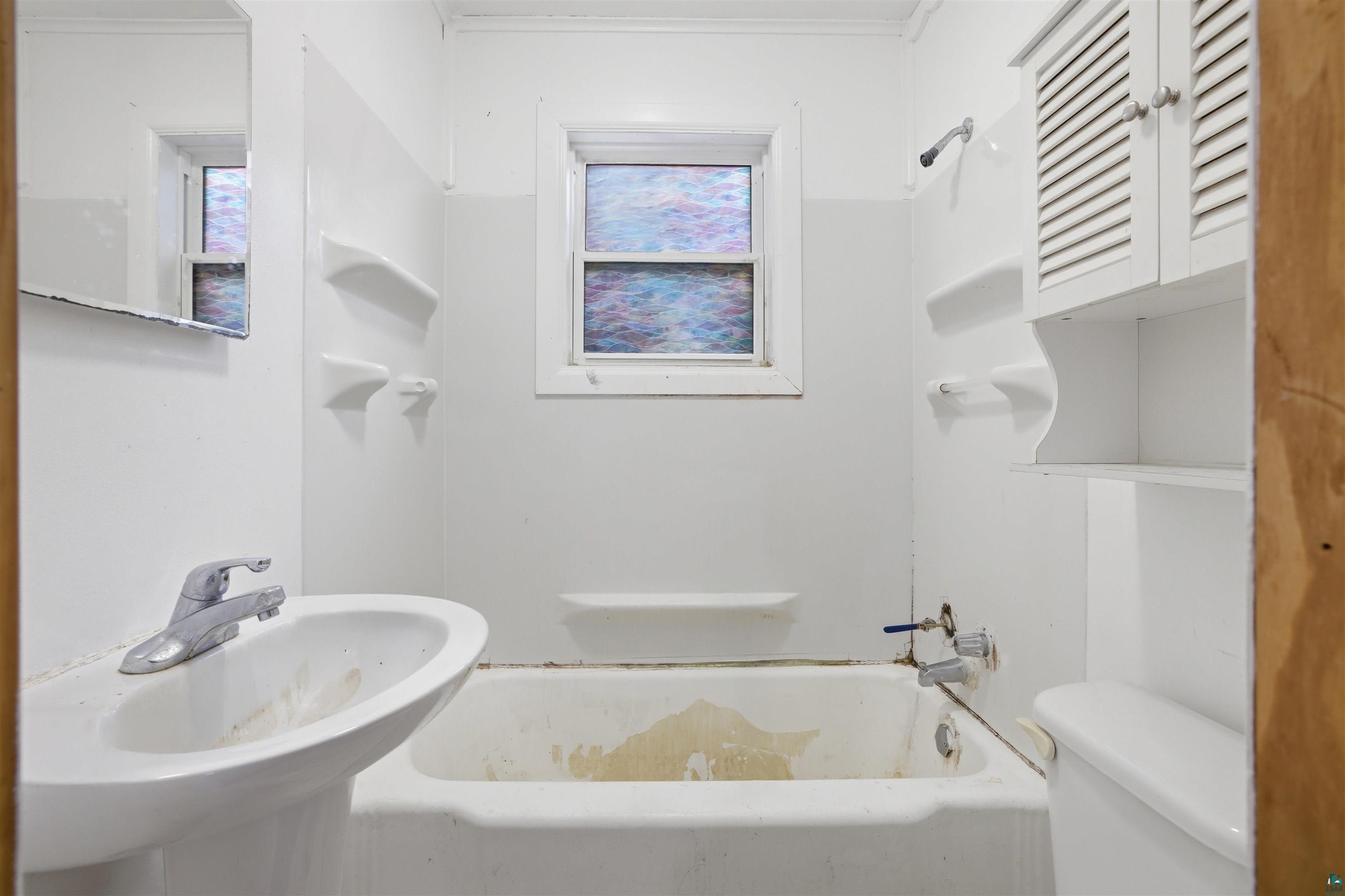 726 Summit Street Eveleth, MN 55734 - Photo 15 of 29 Bathroom featuring bathtub / shower combination