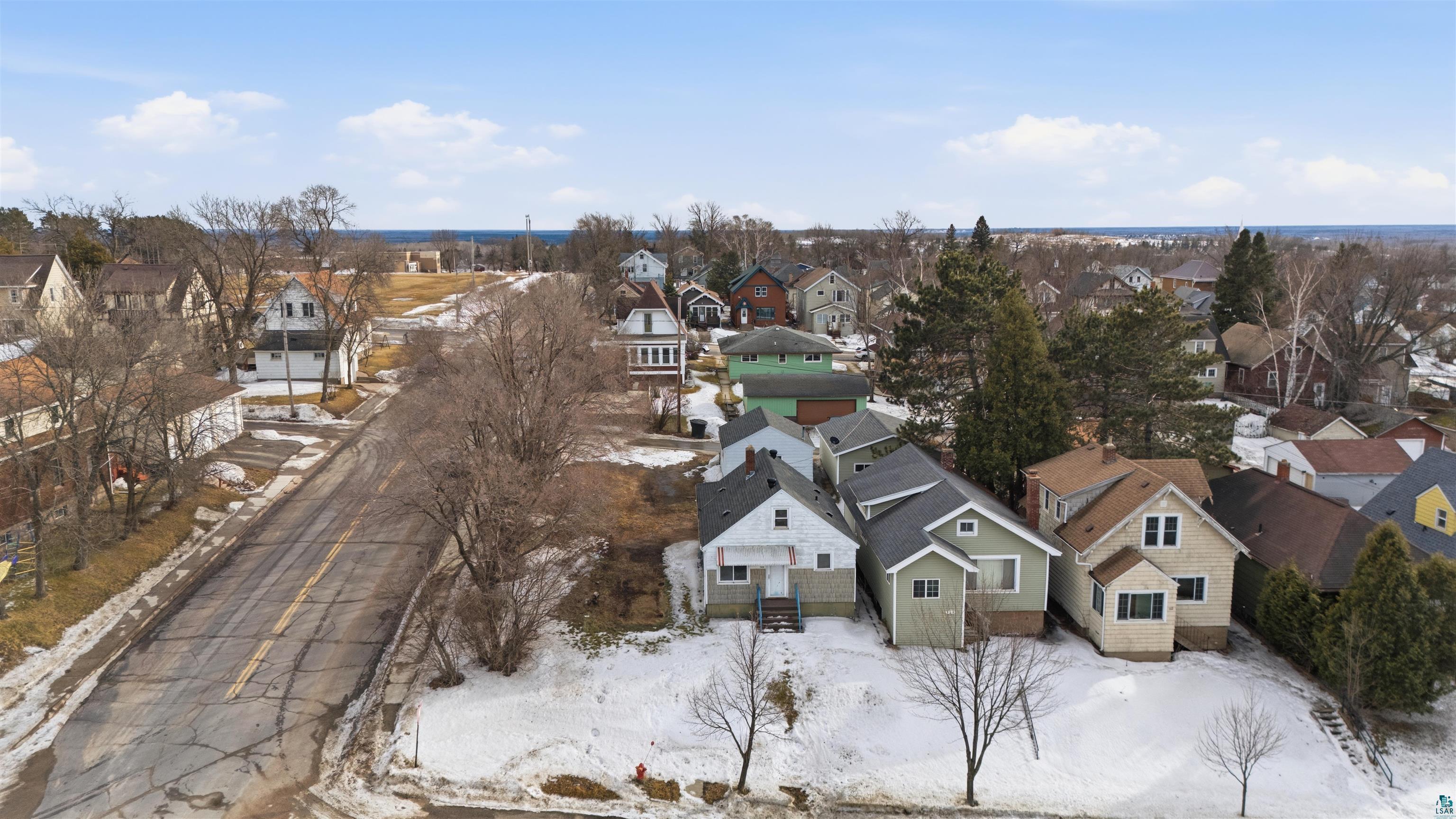 726 Summit Street Eveleth, MN 55734 - Photo 25 of 29 Snowy aerial view featuring a residential view