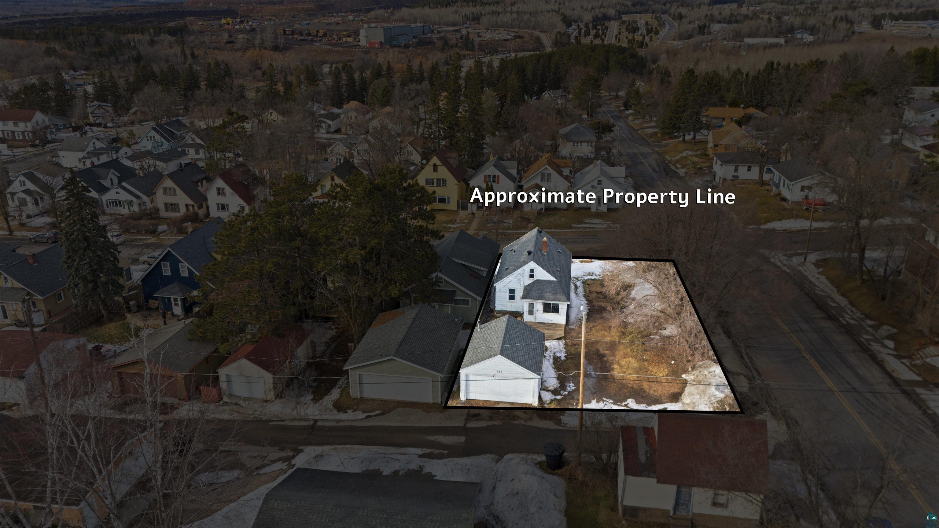 726 Summit Street Eveleth, MN 55734 - Photo 4 of 29 Aerial perspective of suburban area