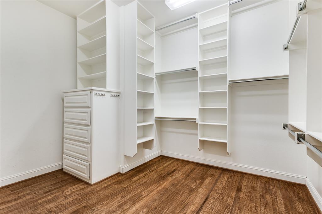 901 Sandy Trail Keller, TX 76248 - Photo 24 of 36 Walk in closet featuring dark wood finished floors