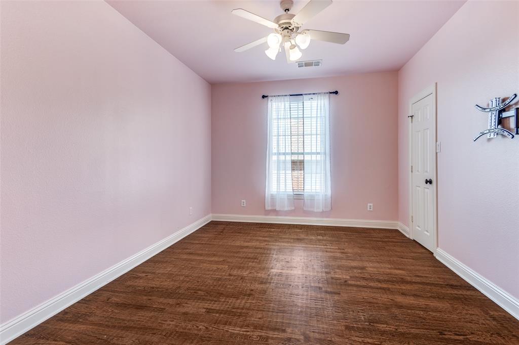 901 Sandy Trail Keller, TX 76248 - Photo 25 of 36 Empty room with dark wood-type flooring and a ceiling fan