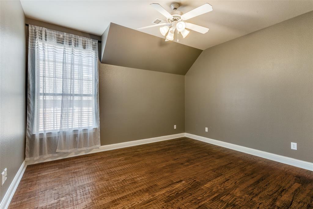 901 Sandy Trail Keller, TX 76248 - Photo 26 of 36 Additional living space with lofted ceiling, ceiling fan, and dark wood-type flooring