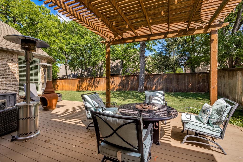 901 Sandy Trail Keller, TX 76248 - Photo 34 of 36 Wooden terrace with a pergola, a fenced backyard, and an outdoor fire pit