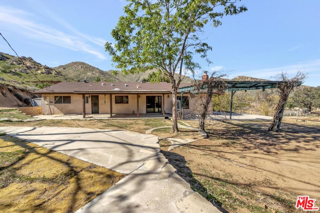 11455 Pigeon Pass Road Moreno Valley, CA 92557 - Photo 16 of 48 a house view with a outdoor space