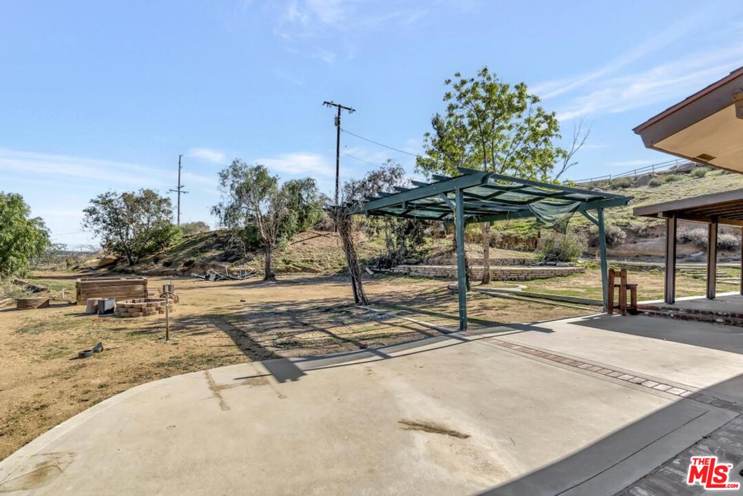 11455 Pigeon Pass Road Moreno Valley, CA 92557 - Photo 22 of 48 a view of a backyard