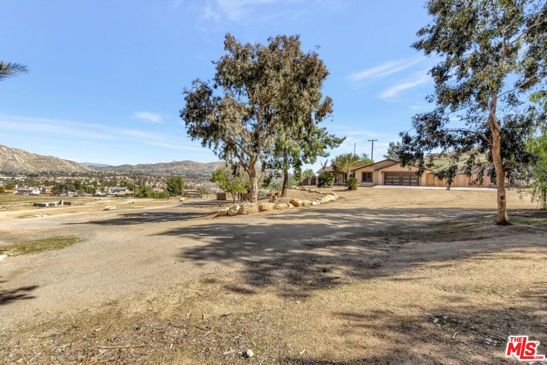 11455 Pigeon Pass Road Moreno Valley, CA 92557 - Photo 3 of 48 a view of yard with ocean view