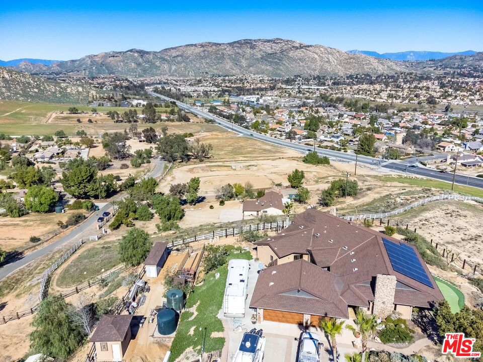 11455 Pigeon Pass Road Moreno Valley, CA 92557 - Photo 39 of 48 an aerial view of residential houses with outdoor space
