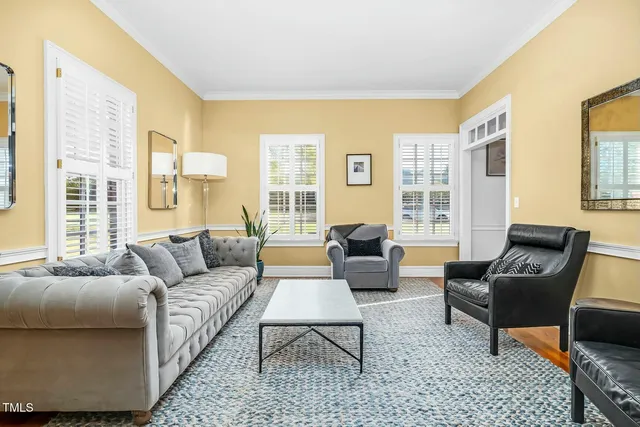 a view of a swimming pool with seating area