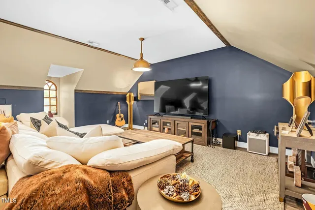 a en suite bathroom with a sink a mirror and a bathtub