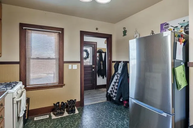 a view of a livingroom with furniture and windows