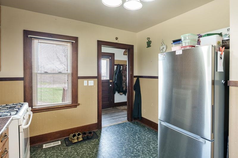 16905 West State Road Pecatonica, IL 61063 - Photo 14 of 47 a refrigerator freezer sitting inside of a kitchen