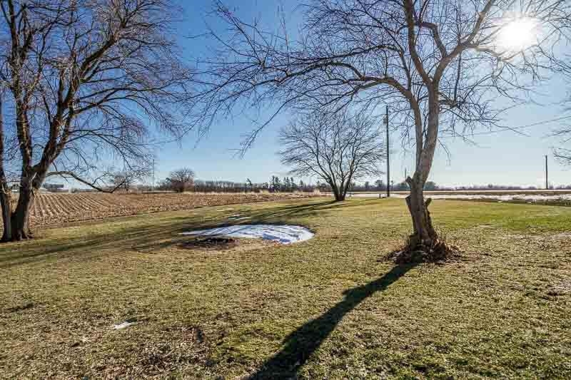 16905 West State Road Pecatonica, IL 61063 - Photo 2 of 36 a view of a yard with an ocean view
