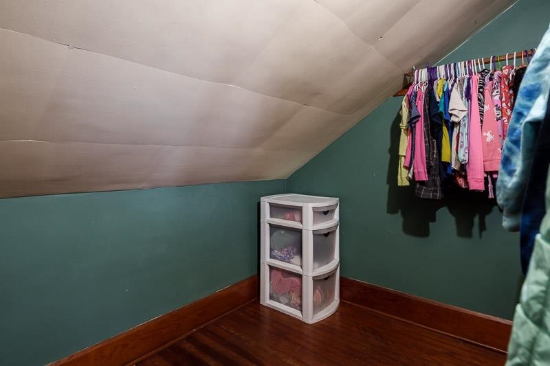 16905 West State Road Pecatonica, IL 61063 - Photo 25 of 36 a room with stairs and wooden floor