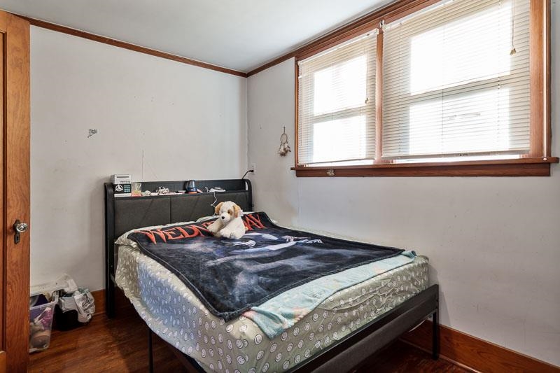 16905 West State Road Pecatonica, IL 61063 - Photo 29 of 36 a bedroom with a bed and a window