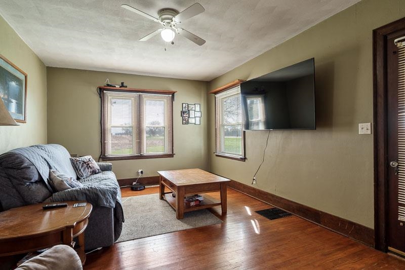 16905 West State Road Pecatonica, IL 61063 - Photo 6 of 47 a living room with furniture and a window