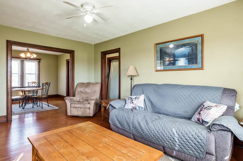 16905 West State Road Pecatonica, IL 61063 - Photo 8 of 47 a living room with furniture and a wooden floor